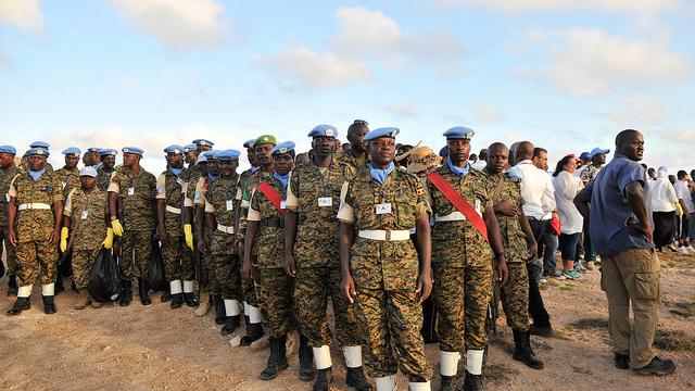 UN military personnel stand in a group outside