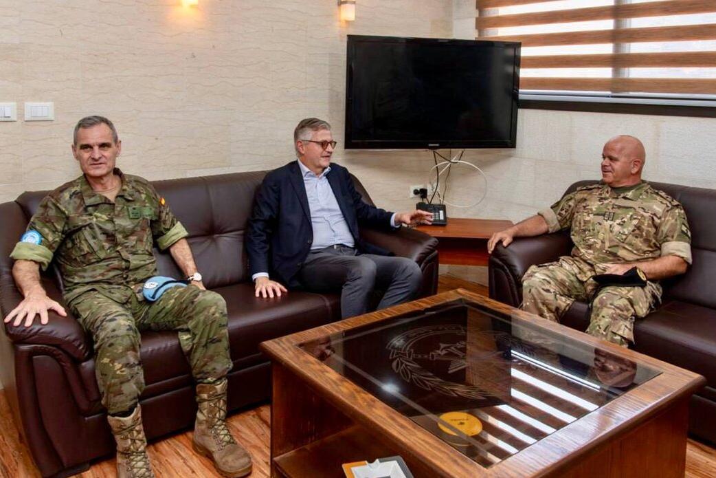 Jean-Pierre Lacroix converses with peacekeepers.